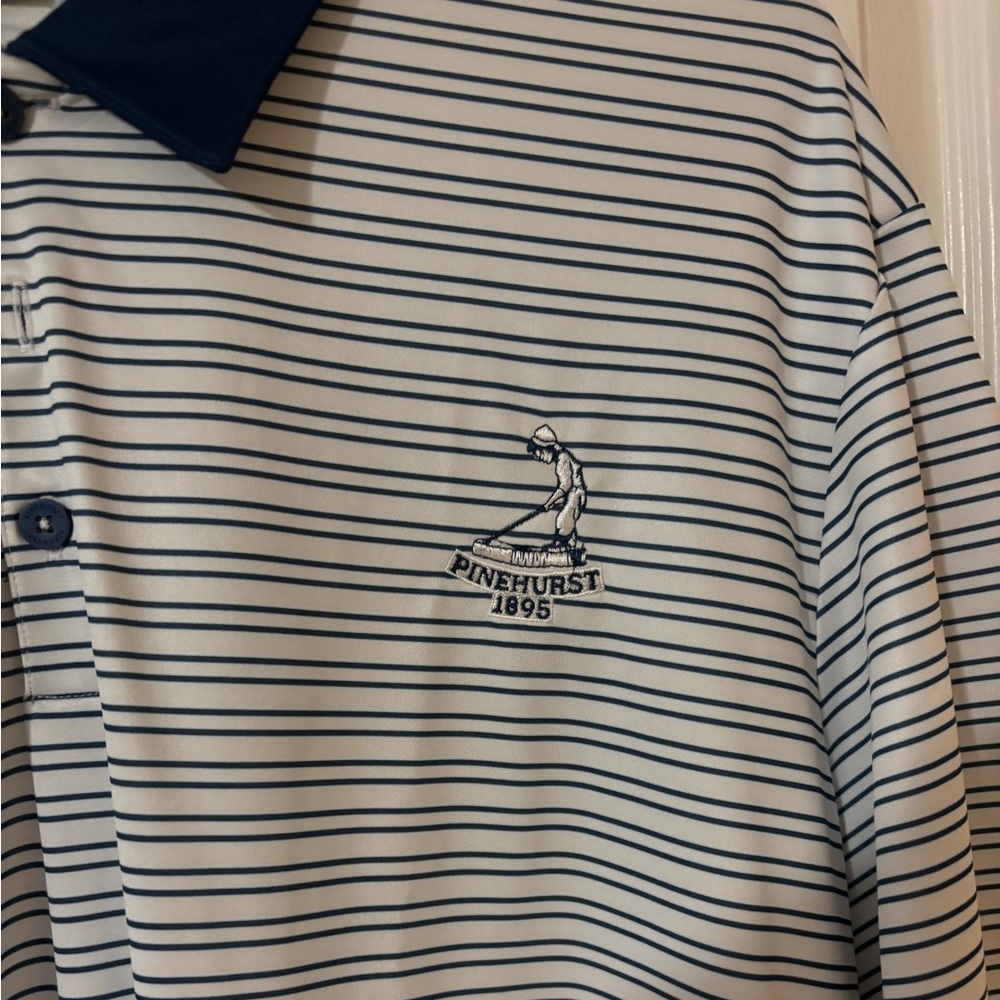 In great condition. 3XL pinehurst polo. navy/white. No returns!